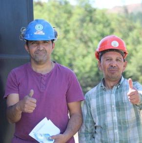 Trabajadores_de_la_construcciขn_tras_recibir_atenciขn_dental_en_la_obra.JPG